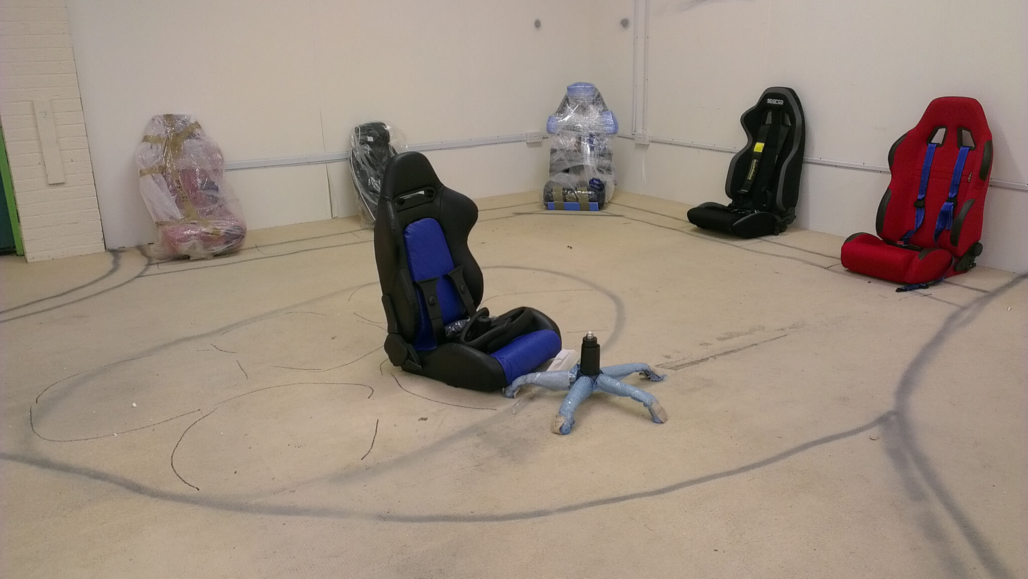 Floor marked out in spray paint to plan the showroom layout