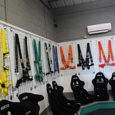 FIA racing harnesses on display at GSM Performance