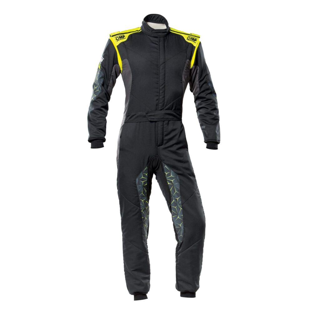 An OMP Tecnica race suit in black and anthracite with yellow shoulders and printed geometric inserts on the legs and sides
