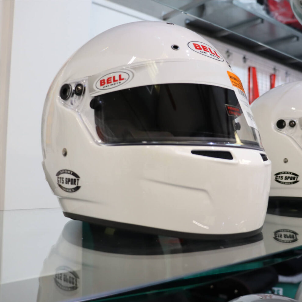 A white Bell GT5 Sport full face helmet on a glass shelf in the GSM Performance showroom