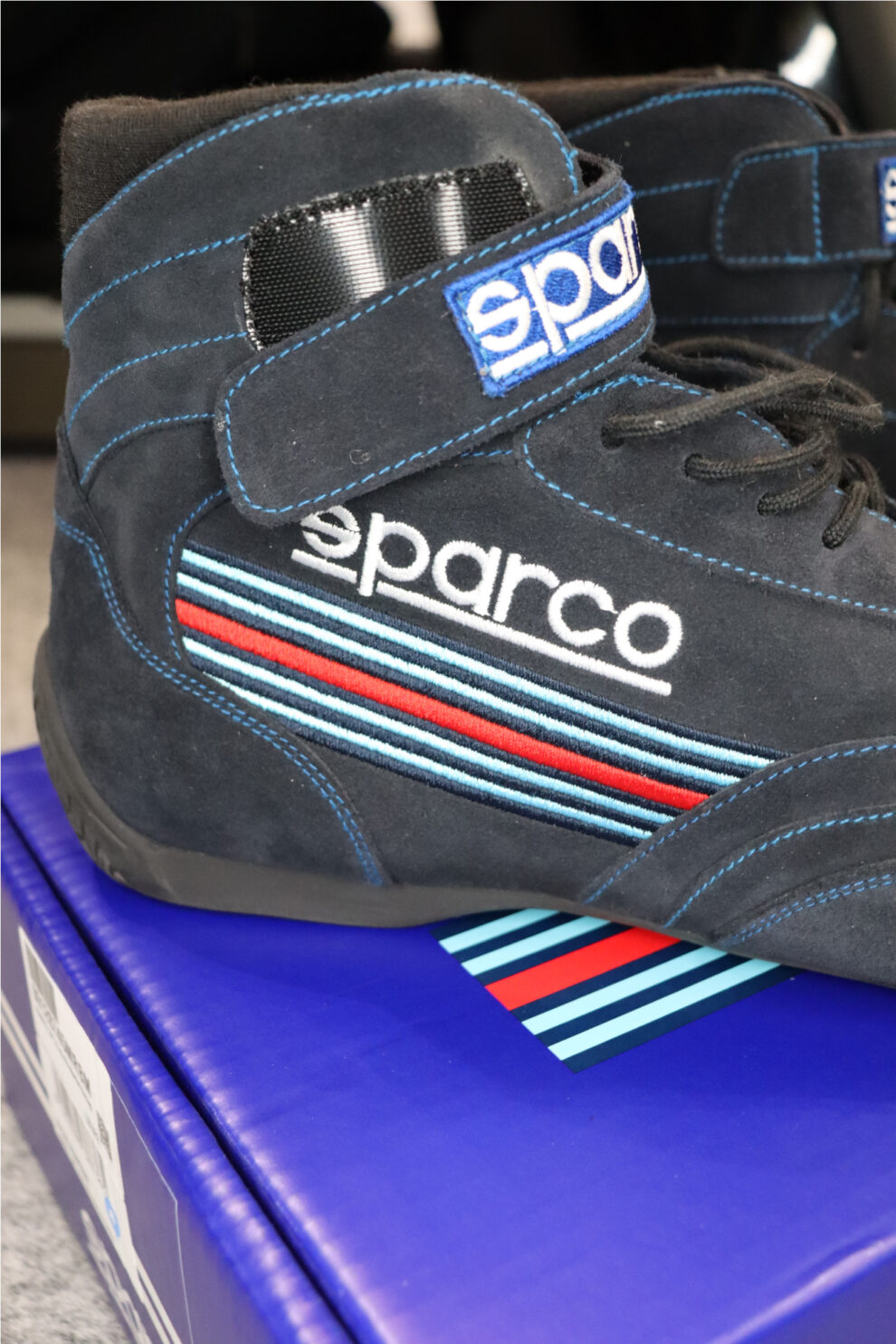 Side view of the Sparco Martini Racing boot showing the Martini stripes, Sparco logo and Velcro ankle strap