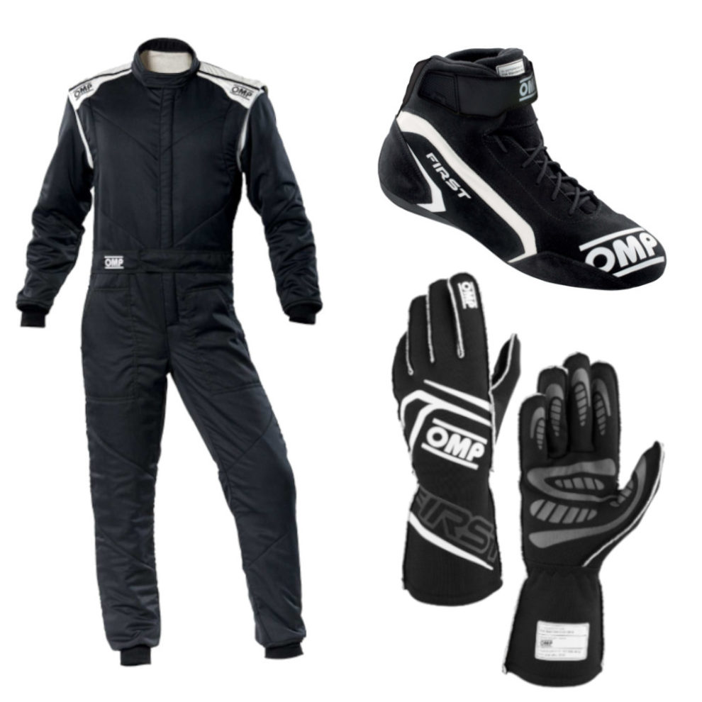 A black OMP First-S race suit, black OMP First boots and black OMP First gloves on a white background