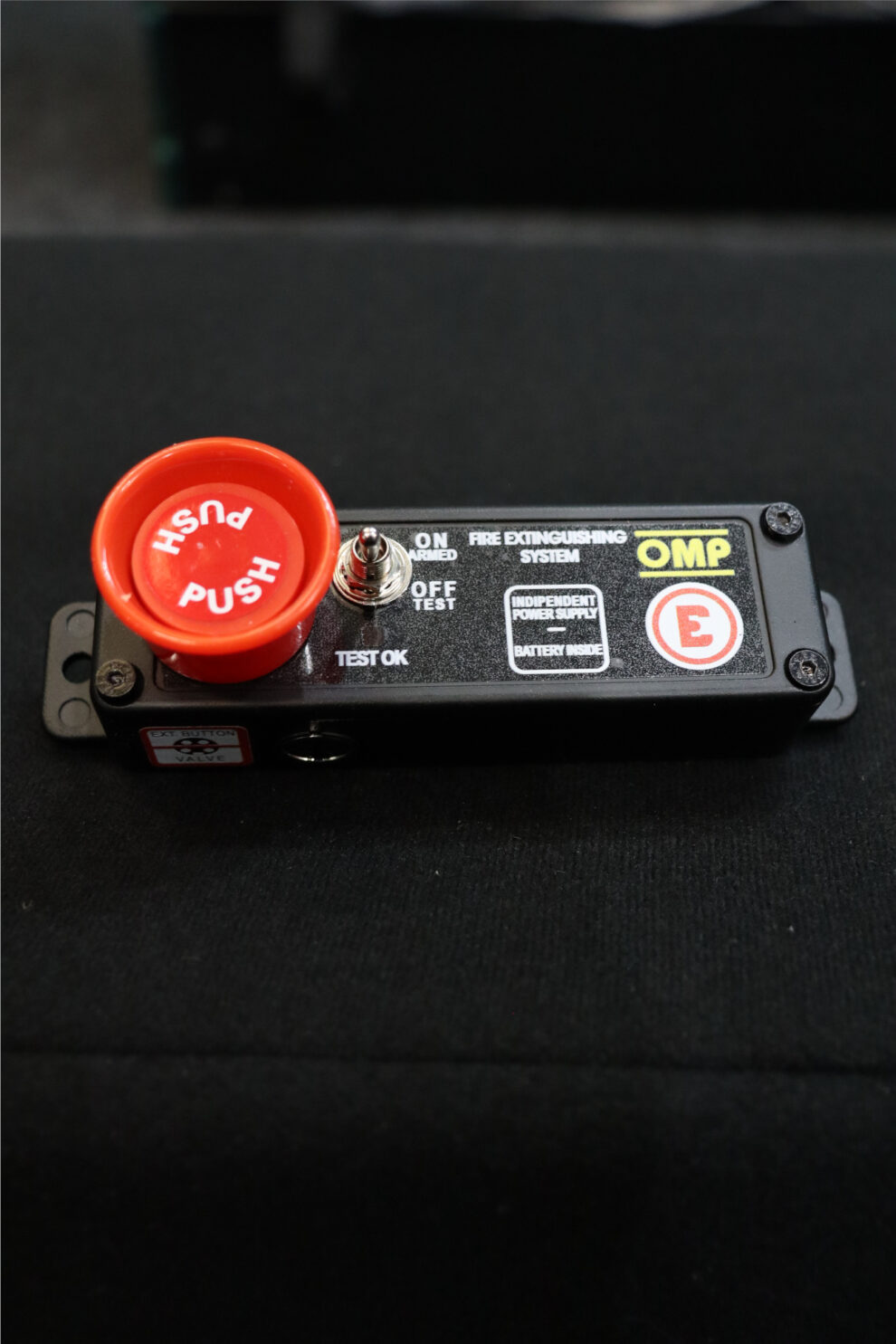 The push button control panel of an OMP electrical fire extinguisher system