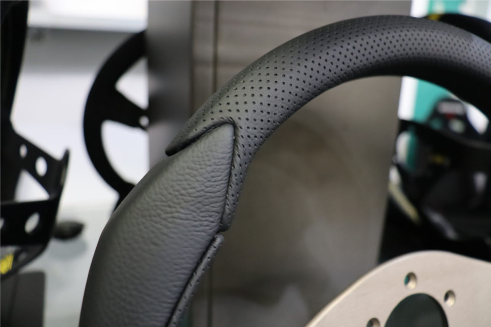 Close view of the MOMO Eagle rim where the smooth leather meets the perforated Airleather section