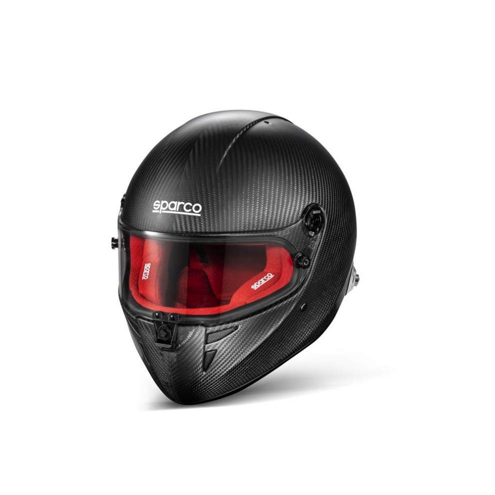 The Sparco Stealth RF Carbon full face helmet in bare carbon with a red interior lining, on a white background