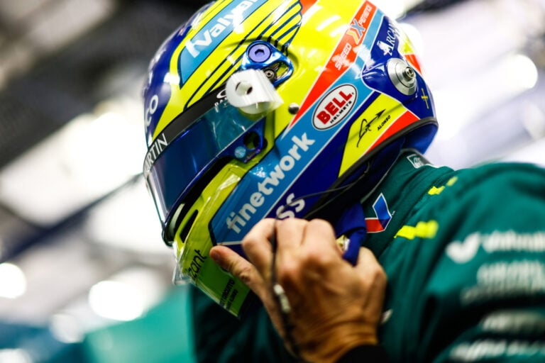 FIA racing helmet being wrapped and painted