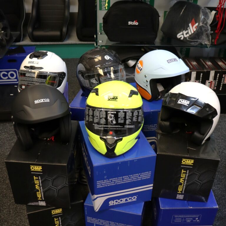 Track day helmets and karting lids on display in store