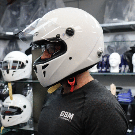 FIA and track day helmets tried on with glasses in store