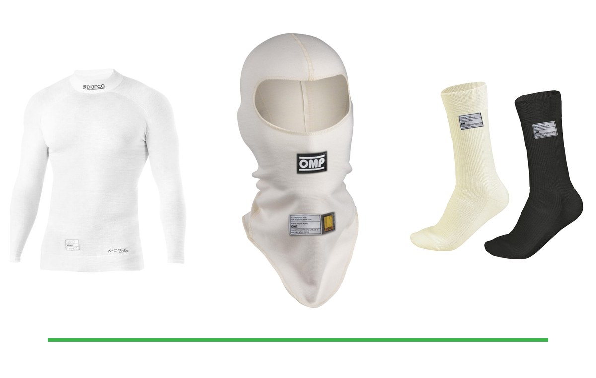 An FIA 8856-2018 fireproof underwear set: a Sparco long sleeve base layer top, an OMP First balaclava and OMP First calf length socks