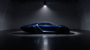 Low sculptural blue hypercar under a single gallery spotlight