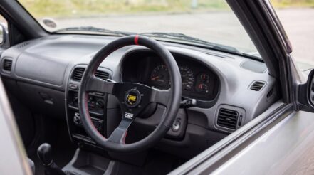 Kia Sportage steering wheel boss kit fitted with an OMP racing wheel, right-hand drive interior