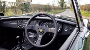 OMP three spoke steering wheel fitted to the column of a right hand drive classic MGB roadster