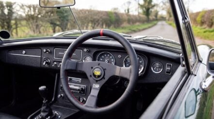 OMP three spoke steering wheel fitted to the column of a right hand drive classic MGB roadster