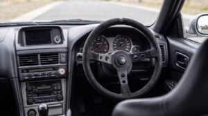 MOMO steering wheel and boss kit fitted in a right hand drive Nissan Skyline R34 GT-R
