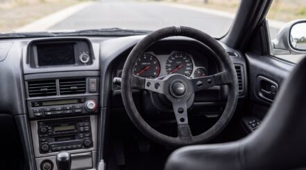 MOMO steering wheel and boss kit fitted in a right hand drive Nissan Skyline R34 GT-R