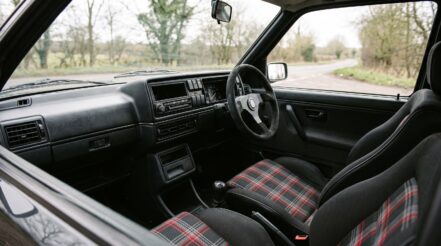 1980s Volkswagen Golf GTI Mk2 fitted with an aftermarket motorsport steering wheel