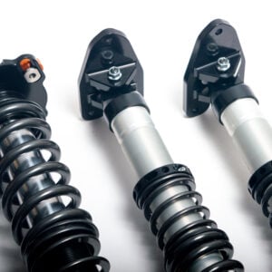 Representative AST 5100 Clubracing coilover suspension kit; vehicle-specific components vary