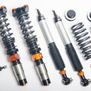 Representative AST 5100 Street Performance coilover suspension kit; vehicle-specific components vary