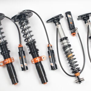 Representative AST 5300 3-Way Motorsport coilover suspension kit; vehicle-specific components vary