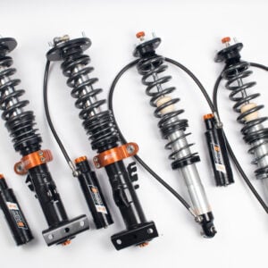 Representative AST 5200 2-Way Motorsport coilover suspension kit; vehicle-specific components vary