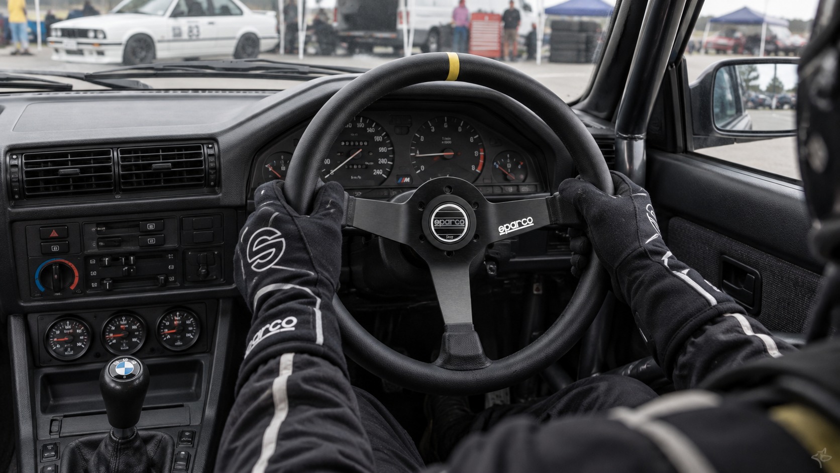 Sparco 345 semi dish steering wheel fitted to a modified right-hand-drive BMW E30