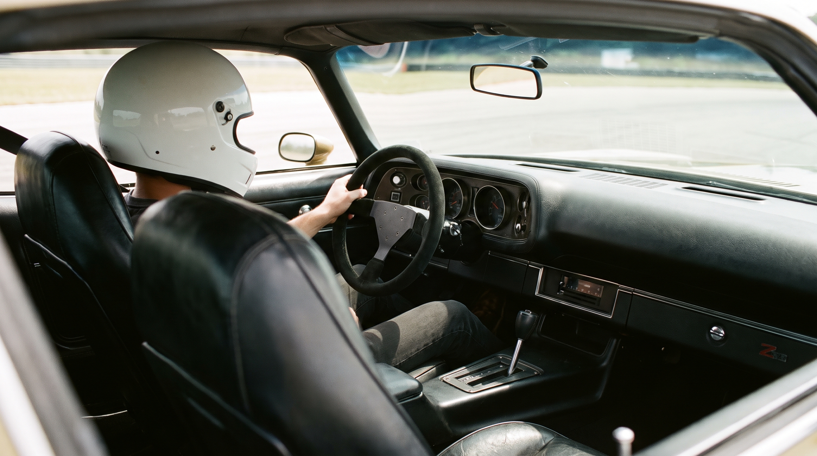 1970s Chevrolet Camaro Z28 fitted with an aftermarket motorsport steering wheel