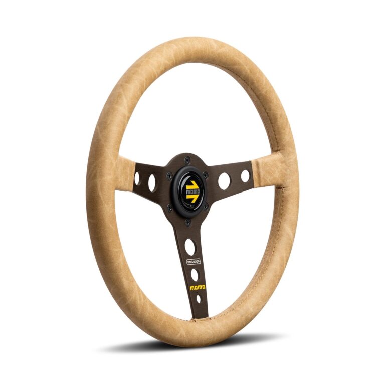 MOMO Prototipo Desert steering wheel at an angle, showing the 39mm dish and the drilled brown spokes