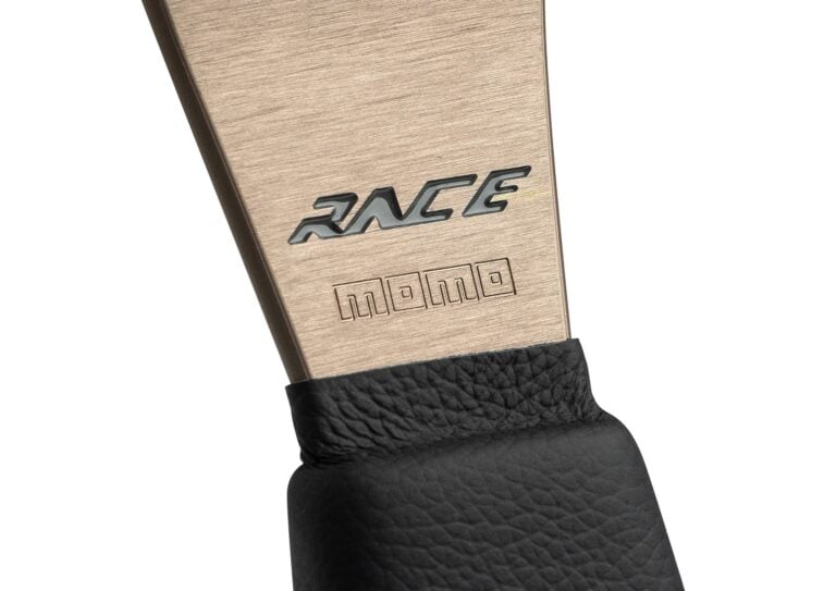 MOMO Race 2.0 steering wheel detail of the engraved RACE logo on the lower spoke