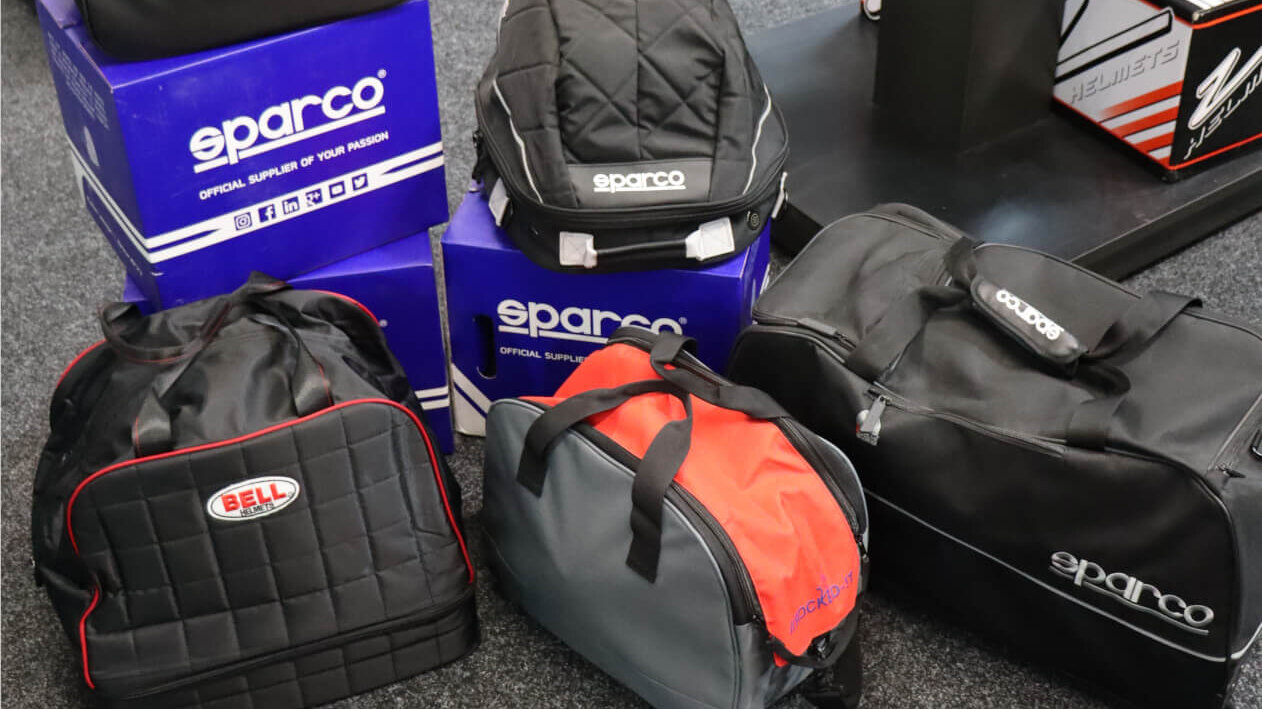 Bell and Sparco helmet and kit bags on the GSM Performance showroom floor