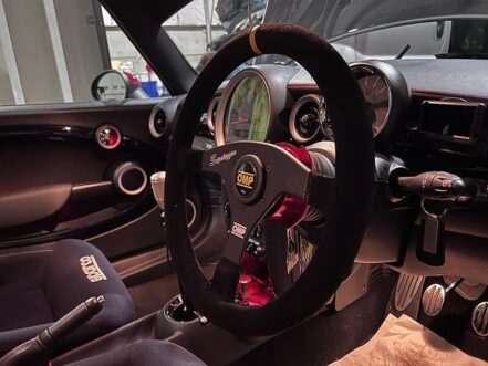An OMP Velocita Superleggero suede steering wheel fitted in a customer's car, seen from the driver's door