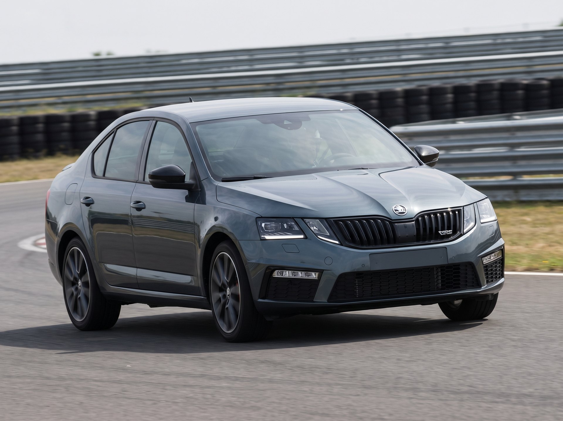 Dark grey Skoda Octavia VRS at a racing circuit, fitted with BC Racing coilovers