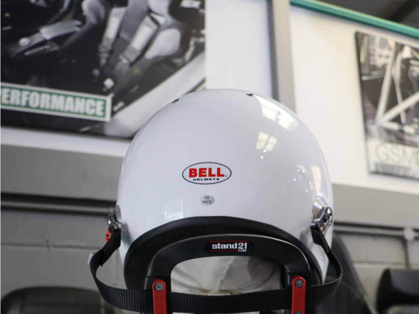 Bell GP3 Sport helmet from behind with a Stand21 Club Series 3 HANS device fitted